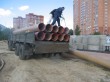 Выгрузка стеклопластиковых труб на объекте